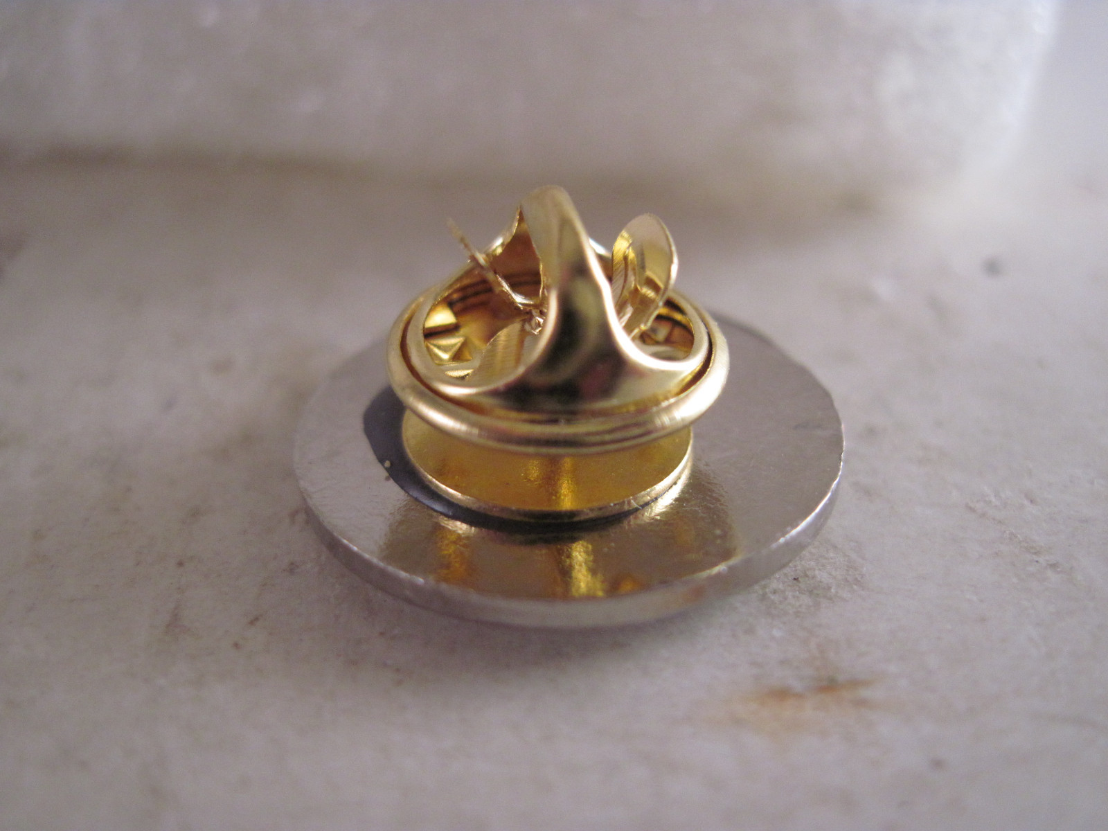 Scales of Justice logo lapel pin white silvertone